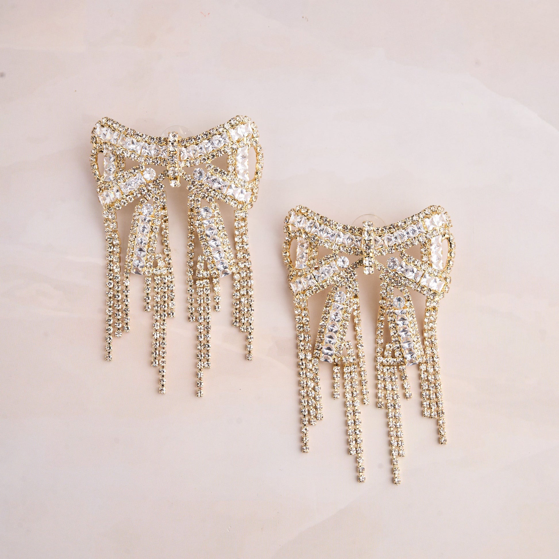 Bow Line Rhine Earrings Mozaati